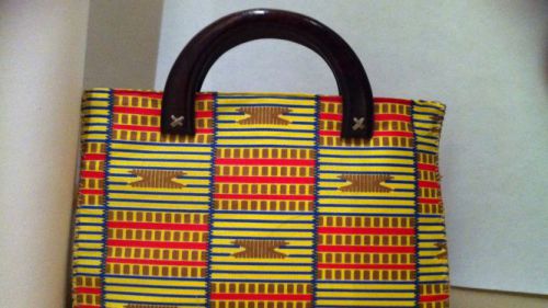 Many believe in Cameroon that putting one’s handbag or backpack on the floor bad