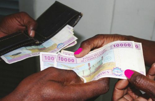 In Cameroon, giving money with the left hand is bad omen