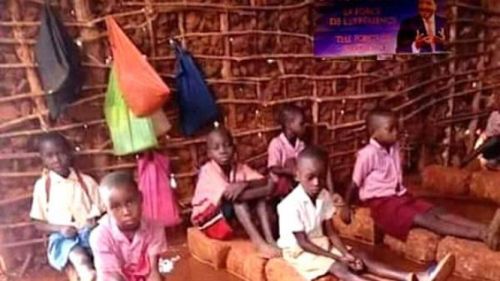 No, this picture of children in a flooded classroom was not taken in Cameroon  
