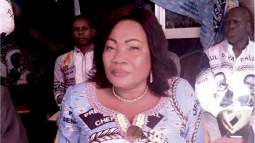 Was Suzanne Julie Fatchom the wife of Maurice Kamto, a member of the opposition party photographed wearing the attires of the ruling party RDPC?